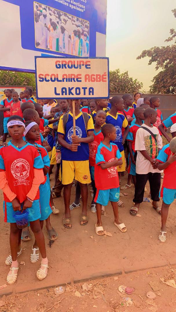 The school football team with coaches and community leaders
